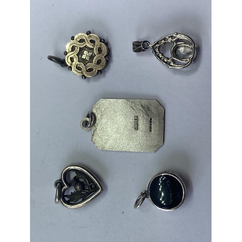 572 - FIVE SILVER PENDANTS