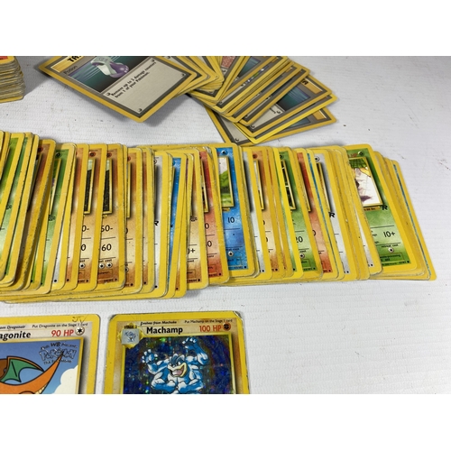 344 - A LARGE COLLECTION OF 1999 WOTC POKEMON BASE SET, ROCKET, FOSSIL AND JUNGLE SET CARDS, 1ST EDITION H... 