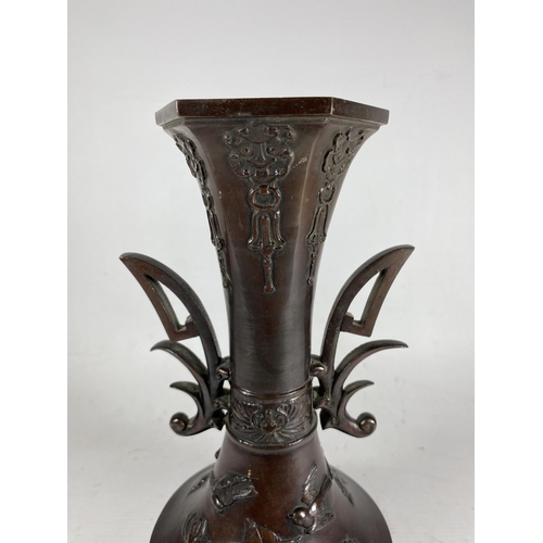 398 - A JAPANESE BRONZE TWIN HANDLED VASE, UNMARKED TO BASE, HEIGHT 28CM