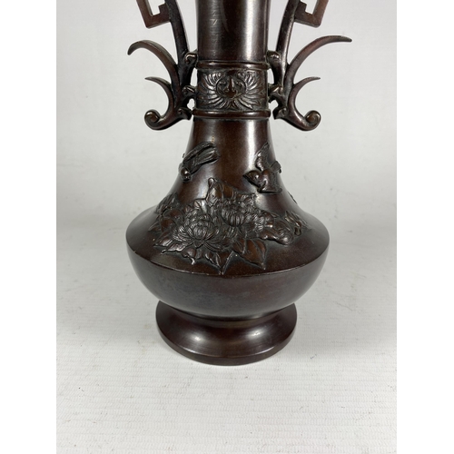 398 - A JAPANESE BRONZE TWIN HANDLED VASE, UNMARKED TO BASE, HEIGHT 28CM