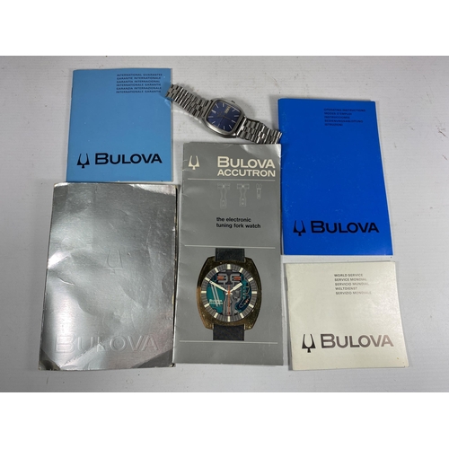 511 - A VINTAGE GENTS BULOVA N8 ACCUTRON DAY DATE WATCH WITH BOOKLETS