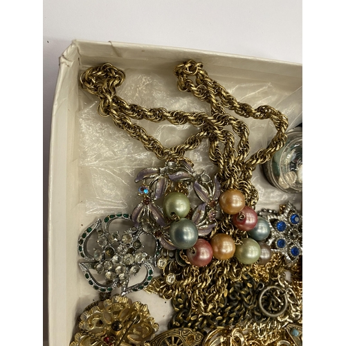 519 - A BOX OF ASSORTED COSTUME JEWELLERY TO INCLUDE YELLOW METAL NECKLACES, WHITE METAL DOVE BUTTONS ETC