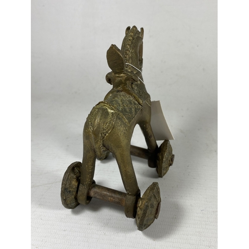 408 - AN UNUSUAL 19TH CENTURY INDIAN METAL TEMPLE TOY MODEL OF A HORSE AND RIDER, HEIGHT 12CM