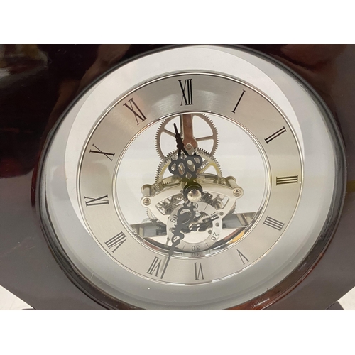 38 - A WOODEN CASED SKELETON MANTLE CLOCK WITH HALLMARKED SILVER PRESENTATION PLAQUE, HEIGHT 22CM