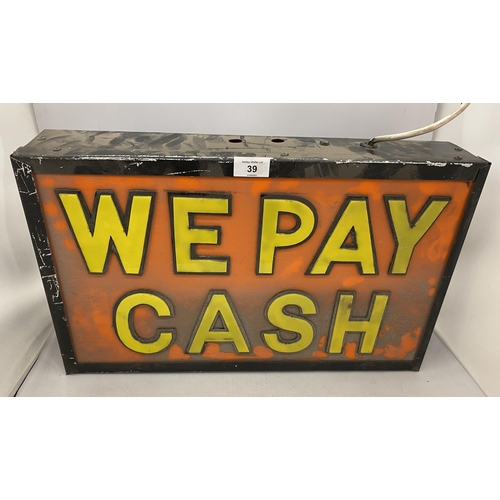 39 - A 'WE PAY CASH' ILLUMINATED BOX SIGN, 32 X 51CM