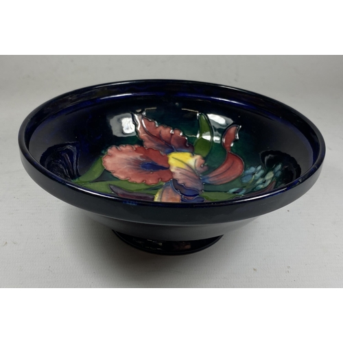 54 - A WALTER MOORCROFT 'ORCHID' PATTERN PEDESTAL BOWL, DIAMETER 16.5CM