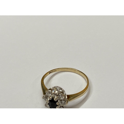 451 - A 9CT YELLOW GOLD RING WITH SAPPHIRE AND CZ STONES, 2G