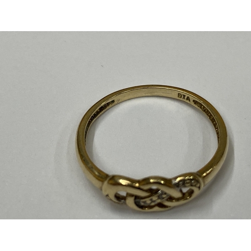 457 - A 9CT YELLOW GOLD HEART SHAPED RING WITH DIAMONDS, WEIGHT 1.3G