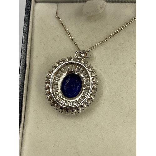 465 - A SILVER AND SAPPHIRE STYLE PENDANT NECKLACE, BOXED