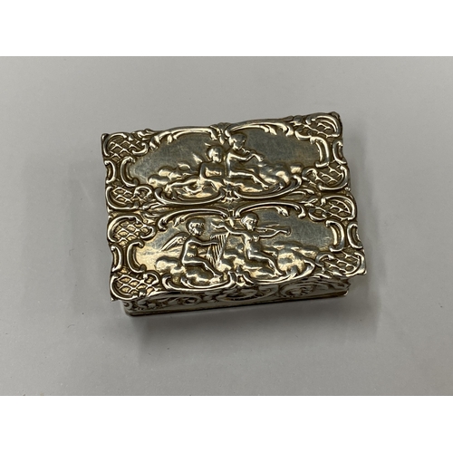 474 - A DECORATIVE SILVER PILL BOX