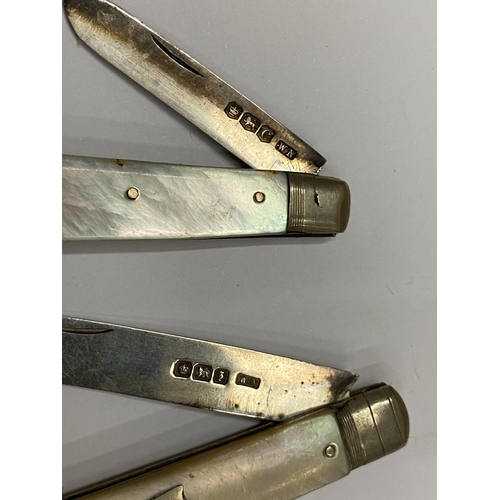 477 - TWO MOTHER OF PEARL AND HALLMARKED SILVER FRUIT KNIVES