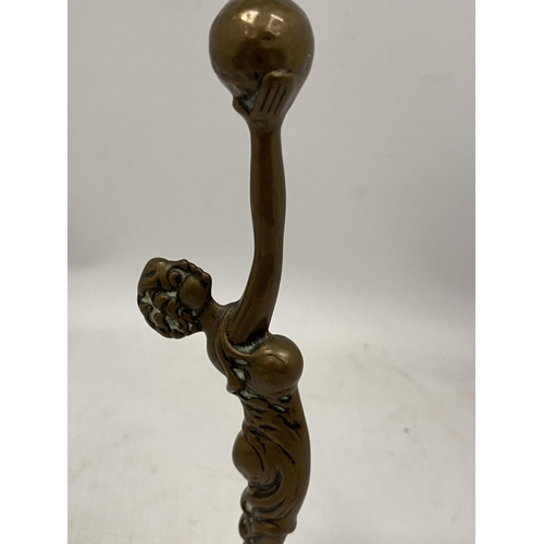 55 - AN ART DECO BRASS FIGURE OF A LADY HOLDING A BALL, HEIGHT 24.5CM