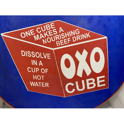 61 - A LARGE METAL OXO CUBE CIRCULAR SIGN, DIAMETER 61CM