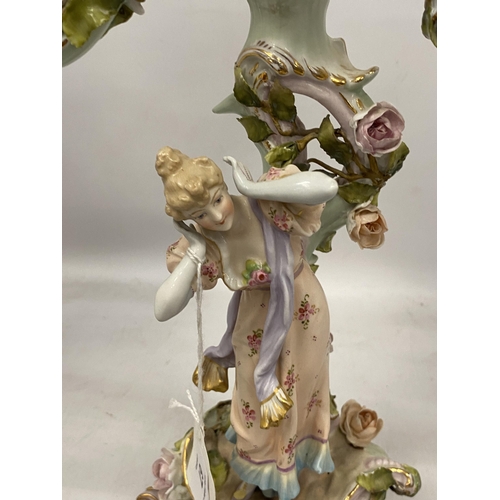 67 - A DRESDEN CONTINENTAL HARD PASTE PORCELAIN CHERUB THREE BRANCH CANDLESTICK, HEIGHT 45CM