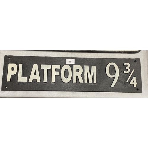 69 - A CAST 'PLATFORM 9 3/4' HARRY POTTER RAILWAY SIGN, LENGTH 58.5CM