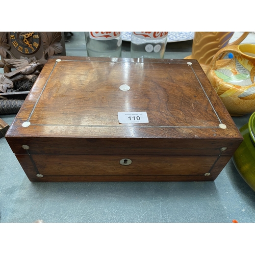 110 - AN ANTIQUE ROSEWOOD JEWELLERY BOX WITH MOTHER OF PEARL INLAY