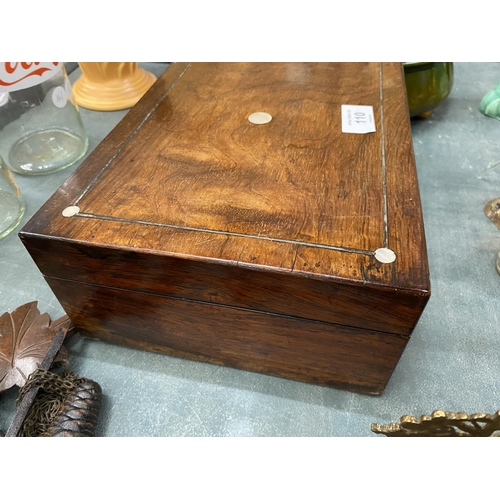 110 - AN ANTIQUE ROSEWOOD JEWELLERY BOX WITH MOTHER OF PEARL INLAY