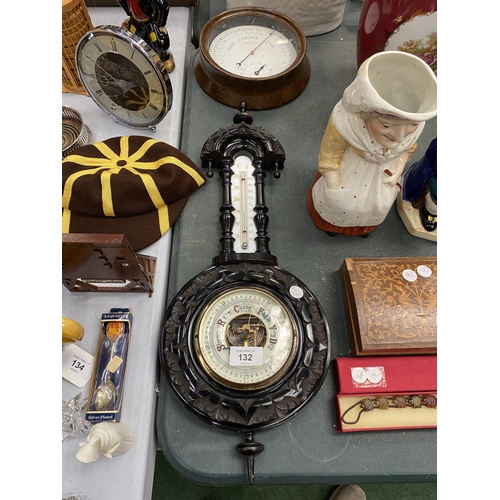 132 - AN EBONY FRAMED VINTAGE BAROMETER AND THERMOMETER PLUS A ROUND METAL BAROMETER