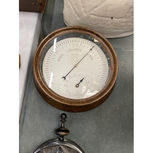 132 - AN EBONY FRAMED VINTAGE BAROMETER AND THERMOMETER PLUS A ROUND METAL BAROMETER