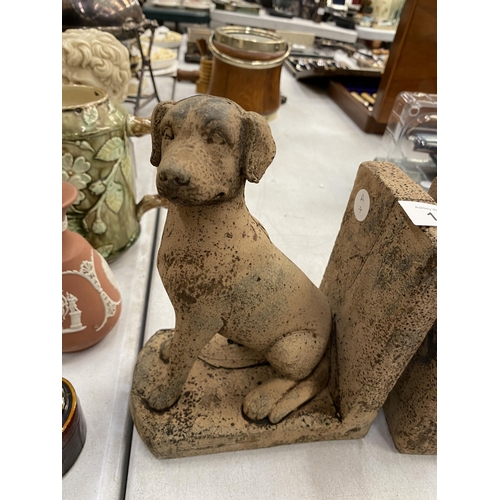 142 - A PAIR OF STONE BOOK-ENDS IN THE SHAPE OF A DOG HEIGHT 21CM