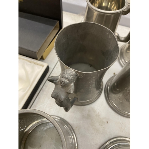 153 - A COLLECTION OF VINTAGE PEWTER TANKARDS TO INCLUDE ONE WITH A NUDE LADY HANDLE