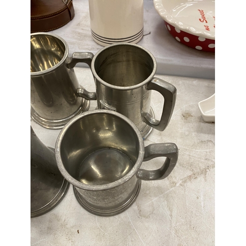 153 - A COLLECTION OF VINTAGE PEWTER TANKARDS TO INCLUDE ONE WITH A NUDE LADY HANDLE