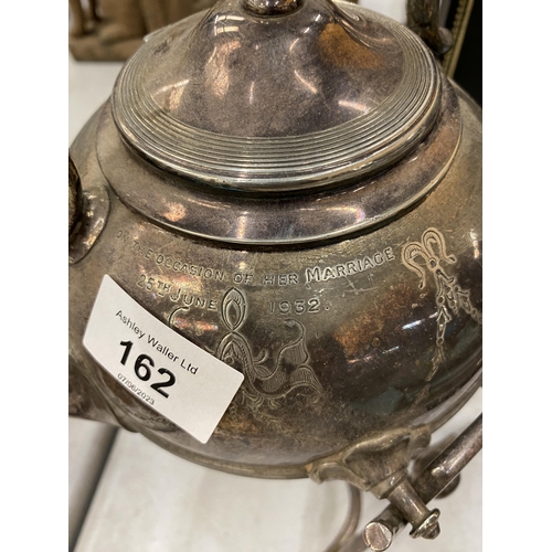 162 - A VINTAGE SILVER PLATED SPIRIT KETTLE PRESENTED TO CAPTAIN FLORENCE M BOYCE ON THE OCCASSION OF HER ... 