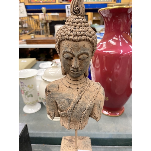 178 - A STONEWARE BUDDAH ON A PLINTH HEIGHT 39.5CM