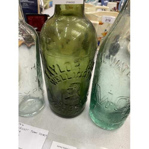 219 - THREE VINTAGE GLASS ADVERTISING BOTTLES