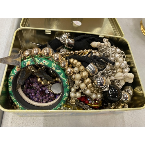 244 - A LARGE QUANTITY OF COSTUME JEWELLERY TO INCLUDE BEADS, NECKLACES, BANGLES, ETC