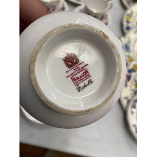 263 - A PARAGON 'MICHELLE' CHINA TEASET TO INCLUDE A CAKE PLATE, SUGAR BOWL, CREAM JUG, CUPS, SAUCERS AND ... 