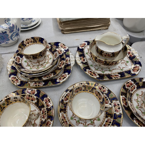 269 - A LARGE EDWARDIAN TEA SET, CUPS, SAUCERS, SIDE PLATES ETC