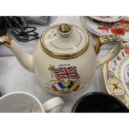 300 - A COLLECTION OF VINTAGE MEMORIBILIA RELATING TO WORLD WAR 1, ETC TO INCLUDE PLATES, A TEAPOT, MUGS, ... 