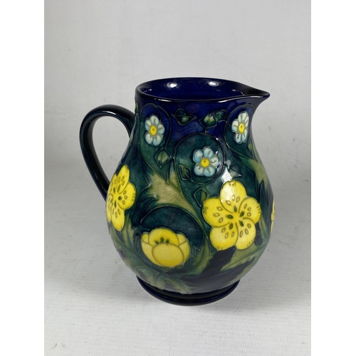 87 - A MOORCROFT POTTERY BUTTERCUP PATTERN JUG BY SALLY TUFFIN