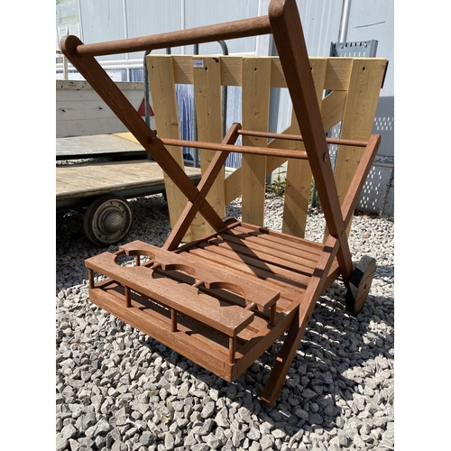 1994 - A WOODEN DRINKS TROLLEY AND A WOODEN GATE