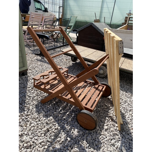 1994 - A WOODEN DRINKS TROLLEY AND A WOODEN GATE