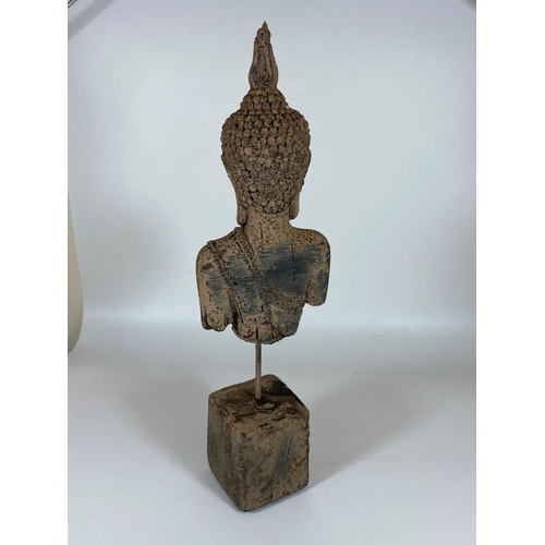 104 - A PAIR OF DECORATIVE STONE BUDDHA HEAD ON PLINTH BASES, HEIGHT 39CM