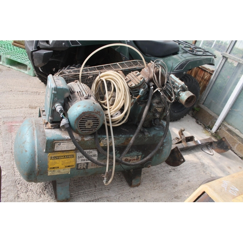 115 - AN INGERSOLL-RAND INDUSTRIAL AIR COMPRESSOR COMPLETE WITH A LENGTH OF AIRLINE PIPE NO VAT