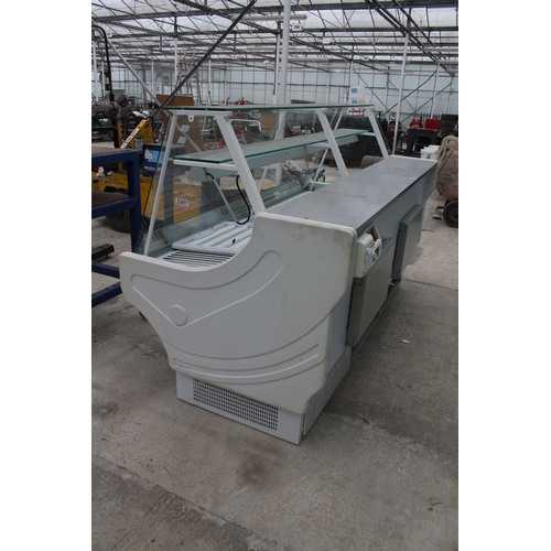 151 - AN INDUSTRIAL GLASS FRONTED SHOP DISPLAY CHILLER NO VAT