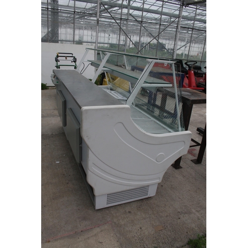 151 - AN INDUSTRIAL GLASS FRONTED SHOP DISPLAY CHILLER NO VAT