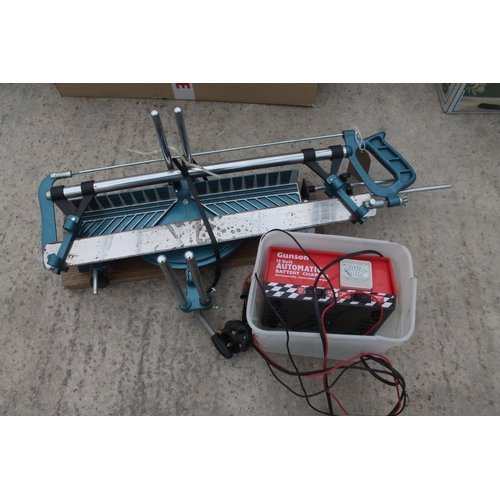 615 - MITRE SAW AND BATTERY CHARGER  NO VAT