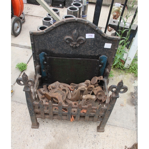 770 - CAST IRON FIRE GRATE , BUTTER CHURN HANDLES AND ROLLER HANDLES  NO VAT