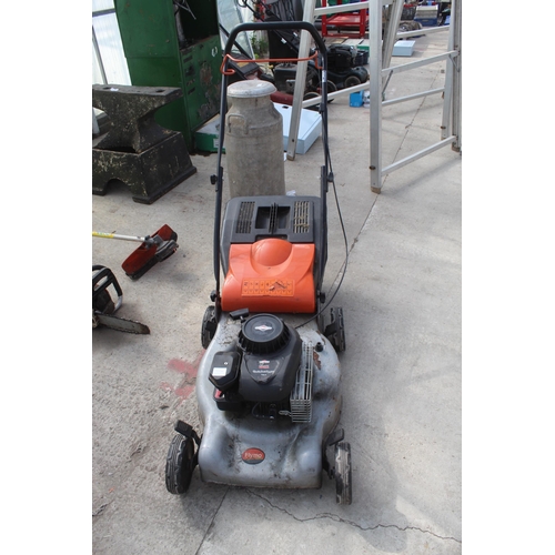 98A - A FLYMO PETROL LAWN MOWER WITH A BRIGGS AND STRATTON ENGINE AND WITH GRASS BOX, BELIEVED IN WORKING ... 