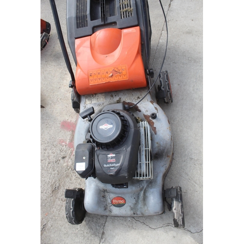 98A - A FLYMO PETROL LAWN MOWER WITH A BRIGGS AND STRATTON ENGINE AND WITH GRASS BOX, BELIEVED IN WORKING ... 