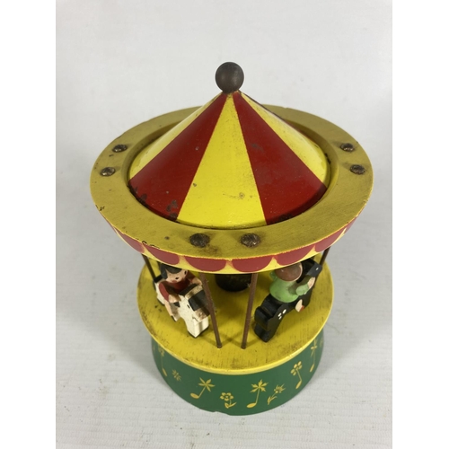 360 - A RARE VINTAGE REUGE WODDEN MERRY-GO-ROUND WITH SWISS MUSICAL MOVEMENT