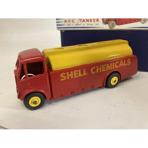 372 - THREE BOXED DINKY TOYS TO INCLUDE AN AEC SHELL CHEMICALS TANKER (NO 991), A EUCLID REAR DUMP TRUCK (... 