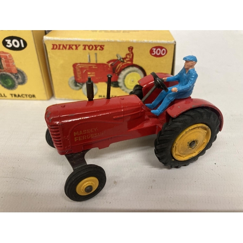 374 - TWO BOXED DINKY MODELS TO INCLUDE A FIELD MARSHALL TRACTOR (NO 301) AND A MASSEY-HARRIS TRACTOR ( NO... 