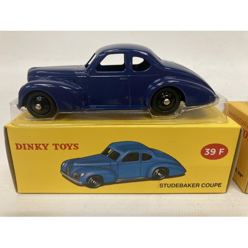 375 - FIVE BOXED DINKY ATLAS MODELS TO INCLUDE A STUDEBAKER COUPE (NO 39F), A PEUGEOT 402 'TAXI' (NO 24L),... 