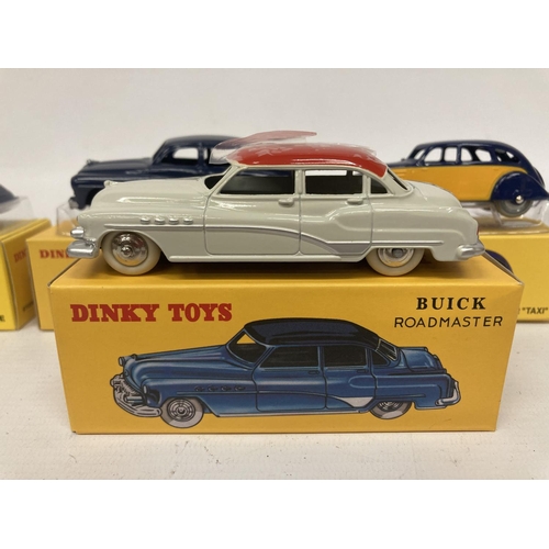 375 - FIVE BOXED DINKY ATLAS MODELS TO INCLUDE A STUDEBAKER COUPE (NO 39F), A PEUGEOT 402 'TAXI' (NO 24L),... 