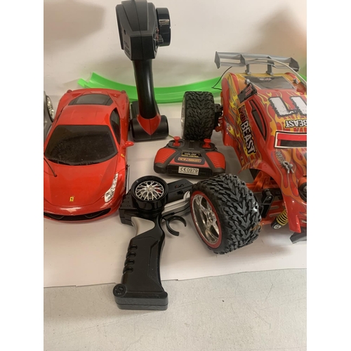 403 - A MIXED LOT OF TOYS TO INCLUDE REMOTE CONTROLLED CARS, CAR TRACK, VEHICLES, ETC